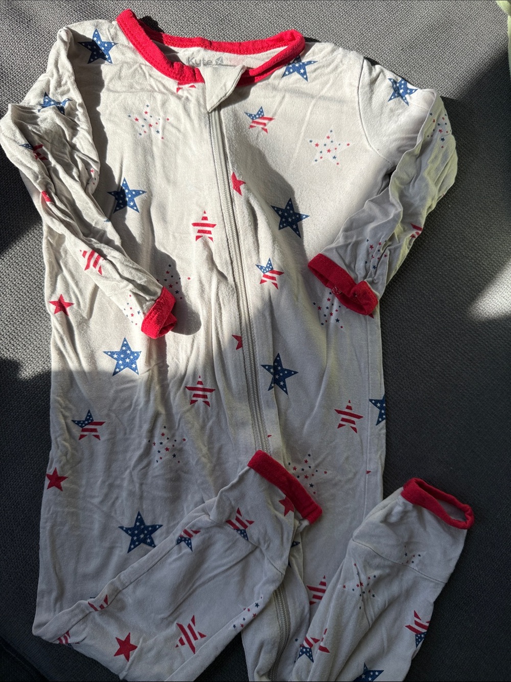 Kyte BABY White Footed Zipper Pajamas with Red & Blue Stars- liberty